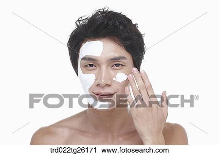 guy is spreading a face pack on his face View Large Illustration Clip Art - guy is spreading a face pack on his face. Fotosearch
