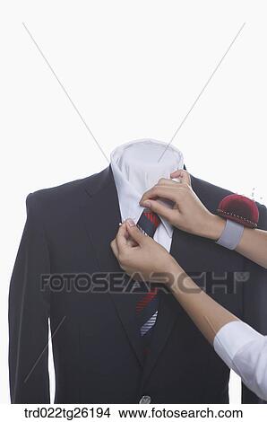 Stock Illustration - hands pinning on the shirt. Fotosearch