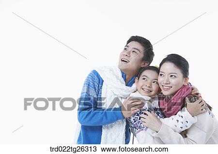 Drawing - parents and girl is hugging each other. Fotosearch
