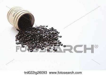 roasted coffee beans poured out from the container View Large Illustration Drawing - roasted coffee beans poured out from the container. Fotosearch