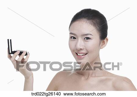 Clipart - woman and makeup tool. Fotosearch
