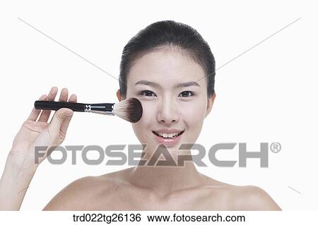 Stock Illustration - woman and makeup tool. Fotosearch