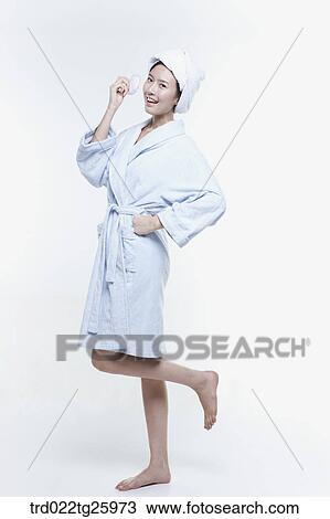 Drawing - woman in a bathrobe with puff. Fotosearch