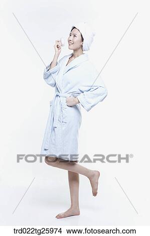 Stock Illustration - woman in a bathrobe with puff. Fotosearch