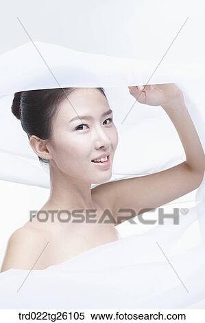 Stock Illustration - woman is wearing a white scarf. Fotosearch