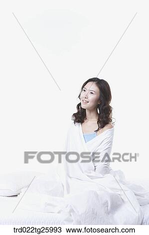 Drawing - woman sitting and wrapped towel. Fotosearch