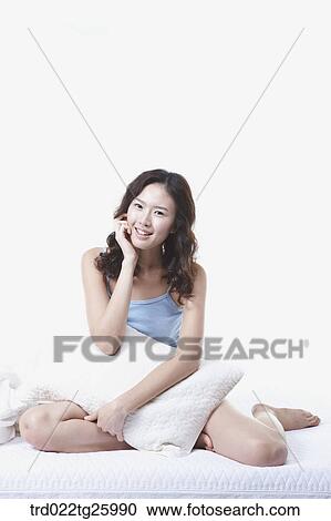 woman sitting on the floor with pillow View Large Illustration Clipart - woman sitting on the floor with pillow. Fotosearch