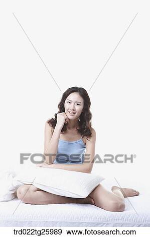 woman sitting on the floor with pillow View Large Illustration Stock Illustration - woman sitting on the floor with pillow. Fotosearch