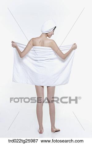 woman spreads out the towel View Large Illustration Stock Illustration - woman spreads out the towel. Fotosearch