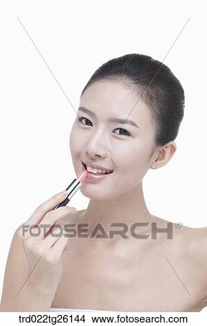 Stock Illustration - woman wearing makeup. Fotosearch
