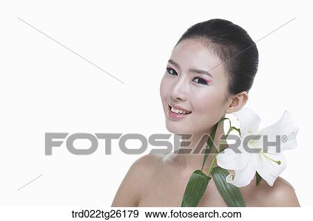 Stock Illustration - woman wearing makeup with blossom. Fotosearch