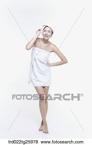 woman wrapped a towel around her body View Large Illustration Stock Illustration - woman wrapped a towel around her body. Fotosearch