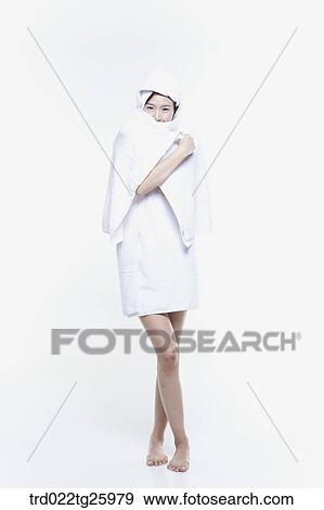 woman wrapped a towel around her body View Large Illustration Stock Illustration - woman wrapped a towel around her body. Fotosearch