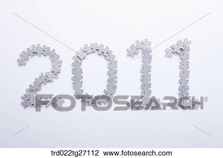 Drawing - 2011 words made by puzzle pieces. Fotosearch