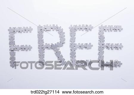 Stock Illustration - FREE words made by puzzle pieces. Fotosearch