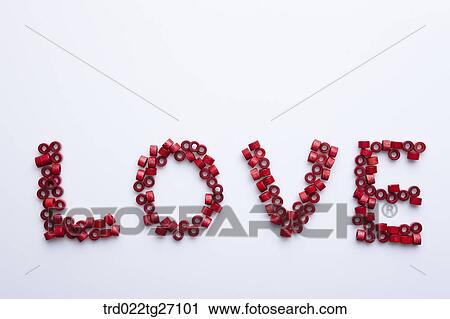 Clip Art - LOVE words in red color. Fotosearch