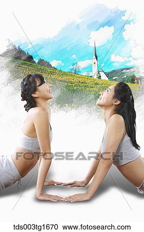 Clipart - women exercising yoga together. Fotosearch