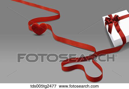 Stock Illustration - heart shaped ribbon and gift. Fotosearch