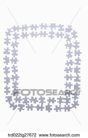 Drawing - puzzles arranged in rectangle shape. Fotosearch