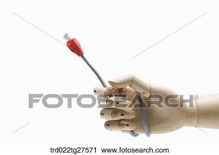 Stock Image - cable in wooden hand. Fotosearch