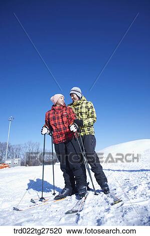 cordial couple having fun in ski resort View Large Photo Image Stock Image - cordial couple having fun in ski resort. Fotosearch