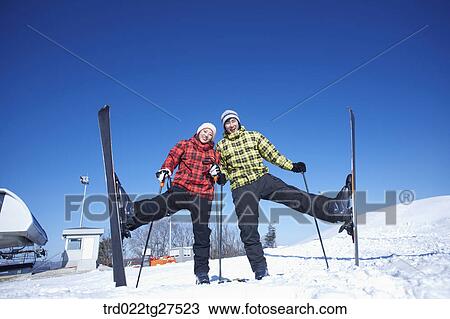 cordial couple having fun in ski resort View Large Photo Image Stock Image - cordial couple having fun in ski resort. Fotosearch