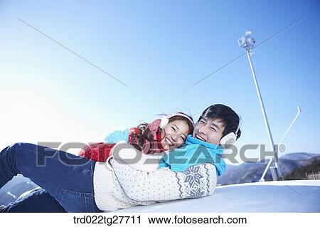 Stock Image - cordial couple hugging tightly. Fotosearch