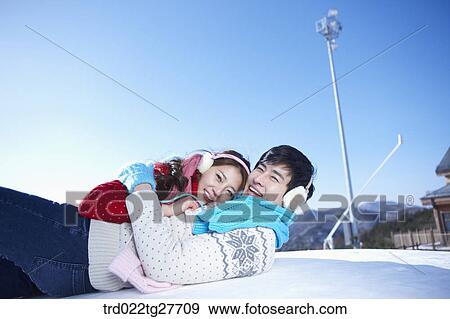 Stock Photo - cordial couple hugging tightly. Fotosearch