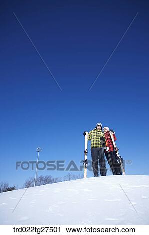 couple enjoy skiing View Large Photo Image Stock Image - couple enjoy skiing. Fotosearch