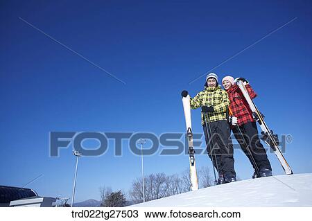 couple enjoy skiing View Large Photo Image Stock Image - couple enjoy skiing. Fotosearch
