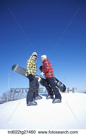 couple enjoying snow board View Large Photo Image Stock Image - couple enjoying snow board. Fotosearch