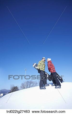 couple enjoying snow board View Large Photo Image Stock Image - couple enjoying snow board. Fotosearch