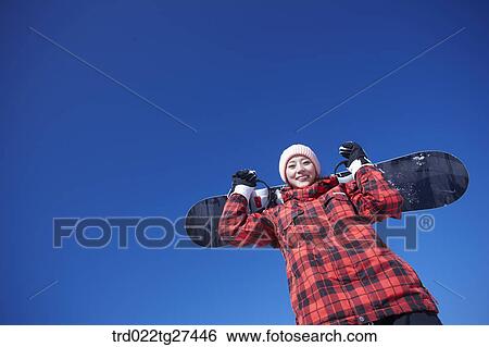 couple enjoying snow board View Large Photo Image Stock Photograph - couple enjoying snow board. Fotosearch