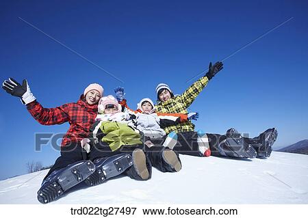 family having fun in ski resort View Large Photo Image Stock Photo - family having fun in ski resort. Fotosearch