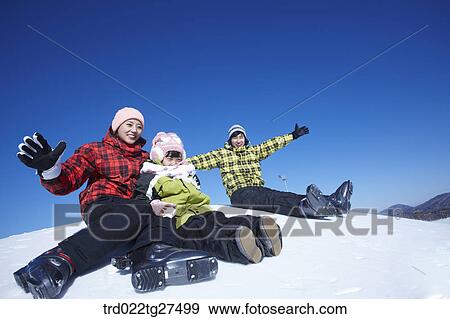 family having fun in ski resort View Large Photo Image Stock Photo - family having fun in ski resort. Fotosearch