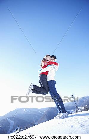 man swept lover up into his arms View Large Photo Image Stock Photo - man swept lover up into his arms. Fotosearch