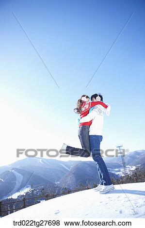 man swept lover up into his arms View Large Photo Image Stock Photo - man swept lover up into his arms. Fotosearch