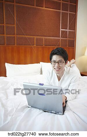 man working on the bed View Large Photo Image Stock Image - man working on the bed. Fotosearch