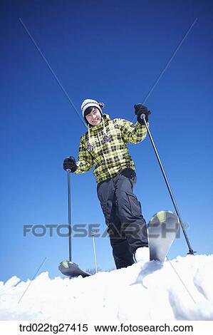 Stock Photography - smile man is skiing . Fotosearch