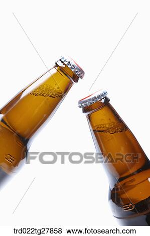 Stock Photo - bottled beer cheers. Fotosearch