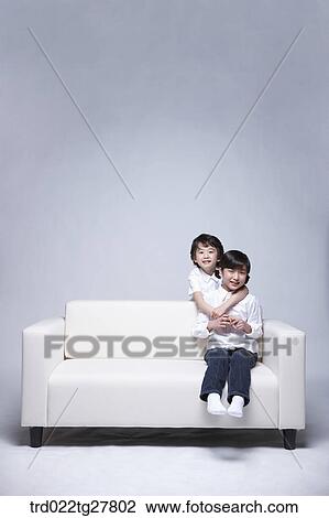 children education boy back hugging a girl View Large Photo Image Stock Image - children education boy back hugging a girl. Fotosearch