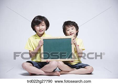 children education holding blackboard together View Large Photo Image Stock Image - children education holding blackboard together. Fotosearch