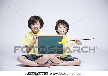 children education holding blackboard together View Large Photo Image Stock Image - children education holding blackboard together. Fotosearch