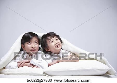 children education lay face down under the blanket View Large Photo Image Stock Image - children education lay face down under the blanket. Fotosearch