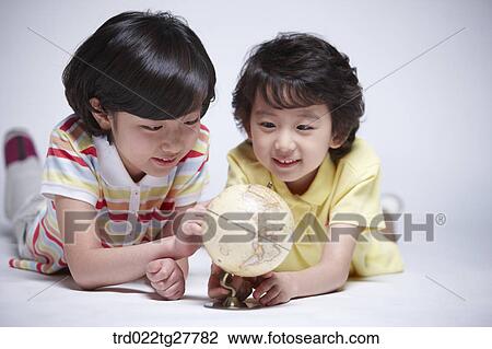 Stock Image - children education playing together. Fotosearch