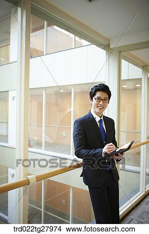 confident working business people View Large Photo Image Picture - confident working business people. Fotosearch