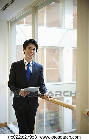 Stock Image - confident working business people. Fotosearch