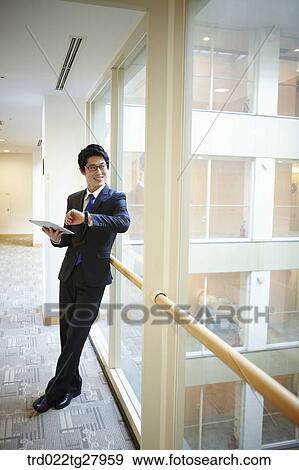 Stock Photo - confident working business people. Fotosearch