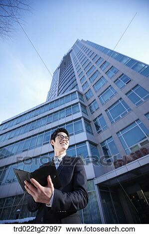 Stock Photo - confident working business people. Fotosearch