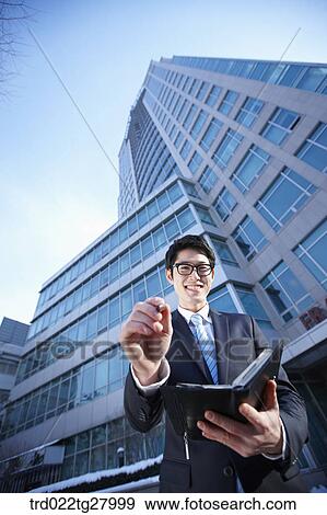 Stock Photo - confident working business people. Fotosearch